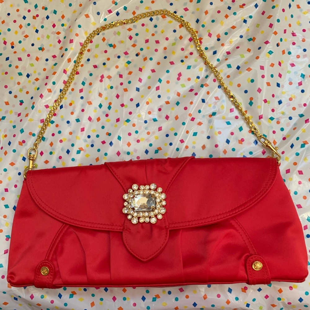 Miss Tina red clutch purse with gold chain handle.